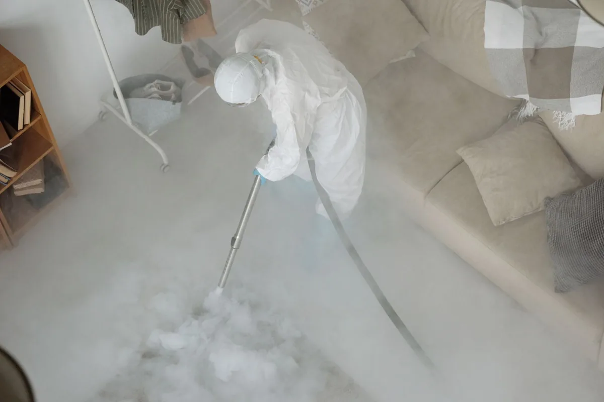 Biohazard cleanup technician in protective equipment, Camino, CA